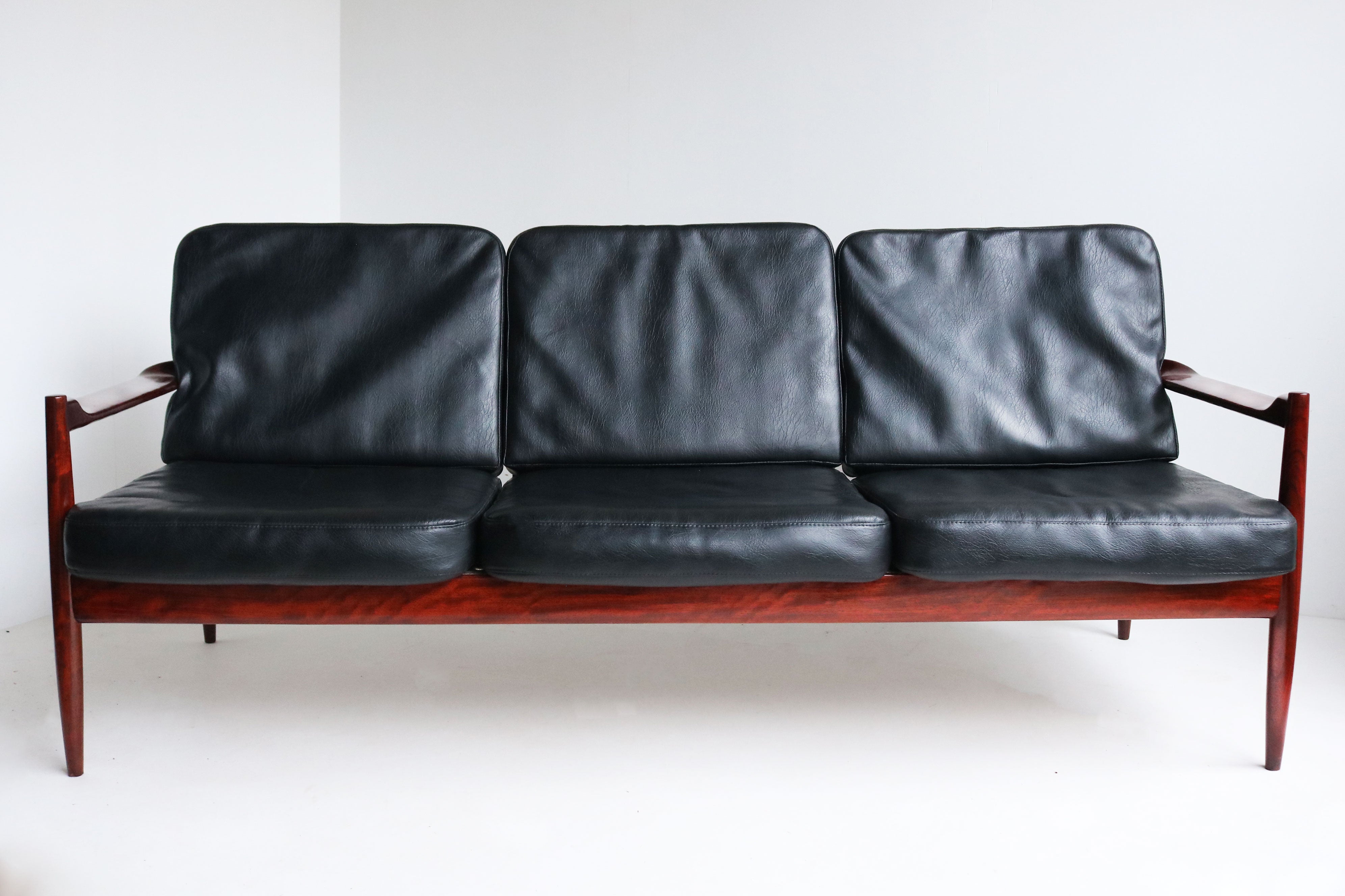 Exquisite Danish Design 3 seater sofa By Grete Jalk in Black Leather & teak 1950