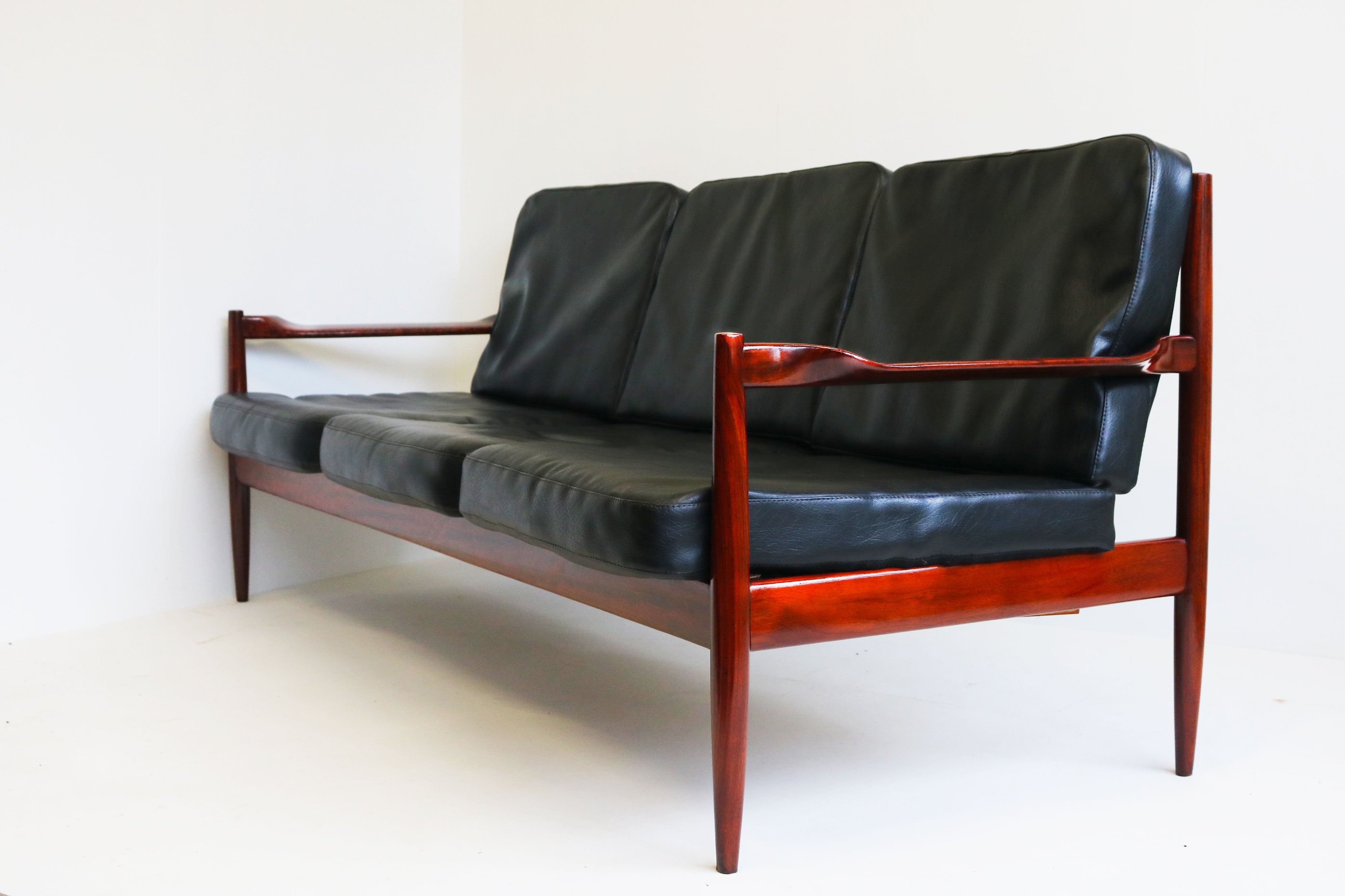 Exquisite Danish Design 3 seater sofa By Grete Jalk in Black Leather & teak 1950